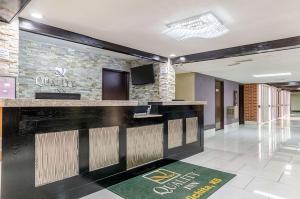 a lobby with a reception desk in a hospital at Quality Inn South in Wichita