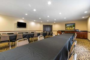 a conference room with a long table and chairs at Sleep Inn Lexington in Lexington