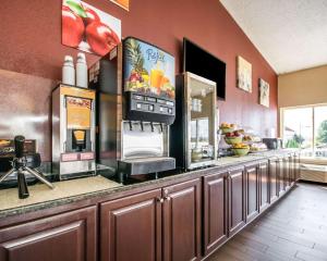 a restaurant kitchen with a counter with aperature at Quality Inn & Suites in Elizabethtown +15 photos