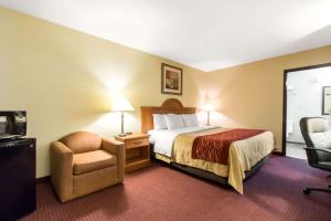 Cama ou camas em um quarto em Quality Inn