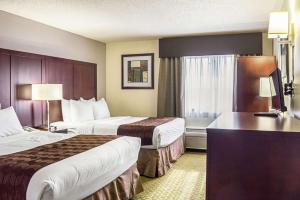 Postel nebo postele na pokoji v ubytování Quality Inn & Suites Clackamas - Portland + 25 fotografií