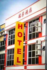 a hotel sign on the side of a building at Hotel Rasah Seremban in Seremban