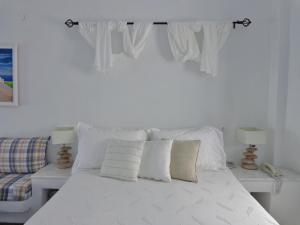 Postel nebo postele na pokoji v ubytování Langas Villas