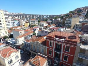 an aerial view of a city with buildings at Minimal Culture Boutique Rooms in Kavála
