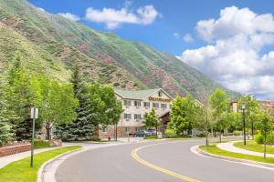 a winding road in front of a mountain at Quality Inn & Suites On The River in Glenwood Springs