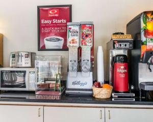 
a kitchen counter with various items on it at Econo Lodge Downtown Colorado Springs in Colorado Springs
