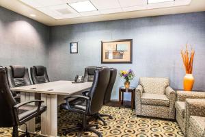 a conference room with a table and chairs at Comfort Inn & Suites in Meriden