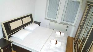 Voodi või voodid majutusasutuse Bus Station Hostel toas