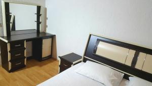 Voodi või voodid majutusasutuse Bus Station Hostel toas