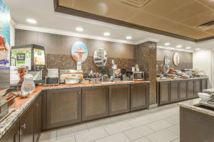 a kitchen filled with lots of counter space at Inn at the Peachtrees, Ascend Hotel Collection in Atlanta