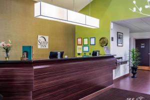 a lobby of a hospital with a reception counter at Sleep Inn near The Avenue in Peachtree City