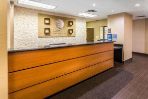a lobby with a reception desk in a hospital at Comfort Inn & Suites Dalton West in Dalton