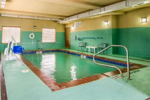 a indoor swimming pool in a building at Sleep Inn & Suites in Athens