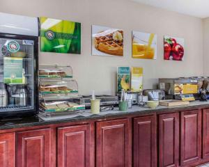 a kitchen with a counter with food on it at Quality Inn & Suites Stockbridge Atlanta South I-75 in Stockbridge