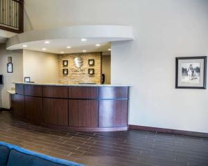 a large lobby with a reception desk in a hospital at Comfort Inn & Suites Riverview near Davenport and I-80 in Le Claire