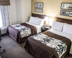 Säng eller sängar i ett rum på Sleep Inn Tinley Park I-80 near Amphitheatre-Convention Center