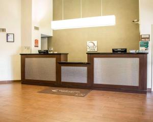 a lobby with a cashier counter in a store at Sleep Inn Midway Airport Bedford Park in Chicago