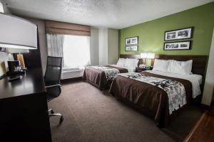 Postel nebo postele na pokoji v ubytování Sleep Inn Rockford I-90