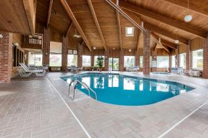 a large swimming pool in a large building at Quality Inn Sycamore - DeKalb in Sycamore