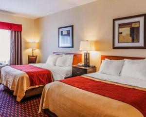 a hotel room with two beds and a window at Comfort Inn Avon-Indianapolis West in Avon