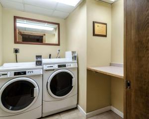 a laundry room with a washer and dryer at Holiday Inn Express - Fall River North in Fall River