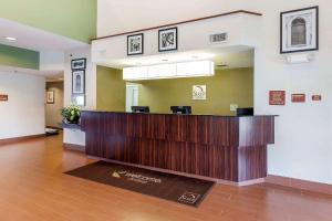 a lobby with a reception desk in a hospital at Sleep Inn Columbia Gateway in Jessup