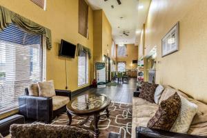 a living room with a couch and a table at Quality Inn Rolla in Rolla