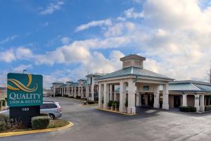 a view of a hotel with a parking lot at Quality Inn & Suites in Clinton