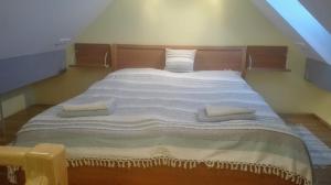 Postel nebo postele na pokoji v ubytování Resort Český ráj