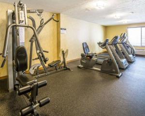 a gym with several treadmills and exercise bikes at Quality Inn Homestead Park in Billings