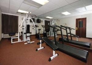 a gym with several tread machines in a room at Quality Inn & Suites Tarboro - Kingsboro in Tarboro