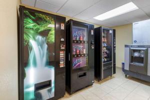 two vending machines are next to each other at Quality Inn Williamston in Williamston