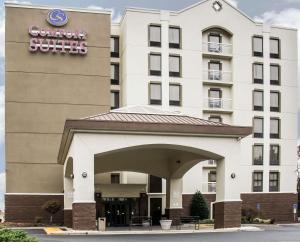 a rendering of the front of a hotel at Comfort Suites University - Research Park in Charlotte