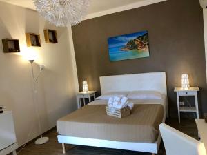 เตียงในห้องที่ B&B La Torre