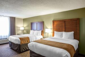 Кровать или кровати в номере Comfort Inn & Suites Kannapolis - Concord