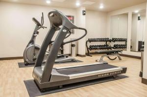 a gym with two tread machines and a treadmill at Comfort Inn Dickinson in Dickinson +16 photos