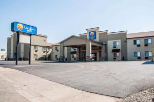 a gas station with a sign in front of it at Comfort Inn Dickinson in Dickinson