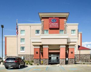 a car parked in front of a hotel at Comfort Suites Minot South in Minot