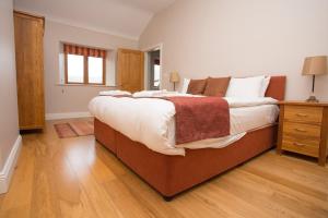 Letto o letti in una camera di Decoy Country Cottages