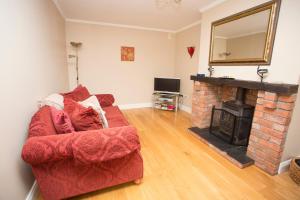 TV o dispositivi per l'intrattenimento presso Decoy Country Cottages