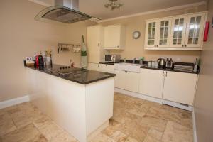 Cucina o angolo cottura di Decoy Country Cottages