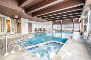 a swimming pool in a hotel room with a pool at Comfort Inn in Concord