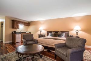 מיטה או מיטות בחדר ב-Riverside Hotel, Ascend Hotel Collection