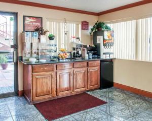 a kitchen with a counter with a coffee maker at Econo Lodge Hobbs in Hobbs