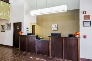 a lobby of a hotel with a reception desk at Sleep Inn Gallup in Gallup