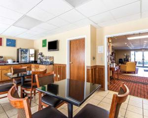 a dining room with a table and chairs at Quality Inn in Seaman