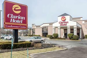 a sign for a carleton hotel in a parking lot at Clarion Hotel and Conference Center in Ronkonkoma