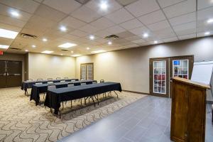 a conference room with rows of tables and chairs at Comfort Inn Downtown in Cleveland