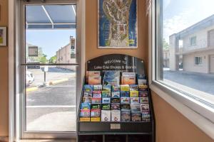 a book vending machine in front of a window at Rodeway Inn Sandusky North in Sandusky