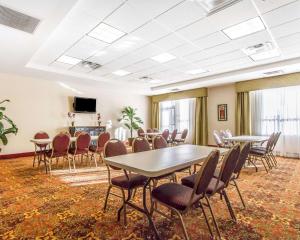 a conference room with tables and chairs and a television at Comfort Inn & Suites Shawnee North near I-40 in Shawnee +25 photos